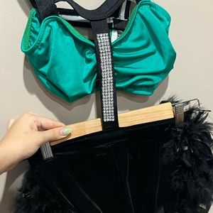 Jazz outfit. Green top black bottom with feathers